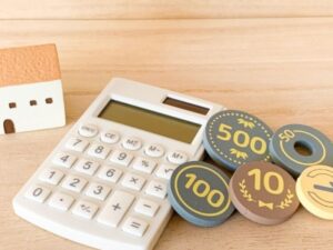 硬貨と電卓で考える外壁塗装のコスト内訳